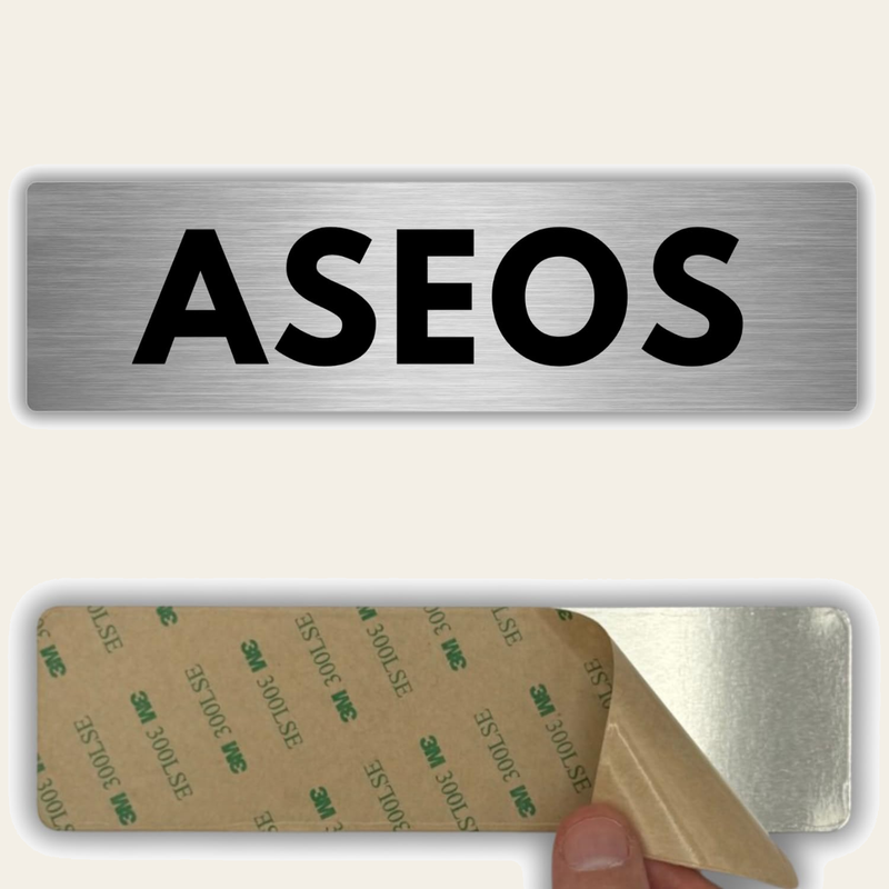 LEIASA | Señal Aseos - 5x18 cm - Grosor 0.8 mm - Aluminio - Cartel Adhesivo - Rótulo Servicios - Señalización Baños - Lavabos (Aseos)