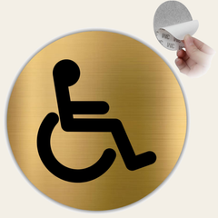 LEIASA | Señal Baño Minusválidos - Ø 10 cm - Aluminio Dorado - Grosor 0.8 mm - Resistente Exterior - Impresión UV